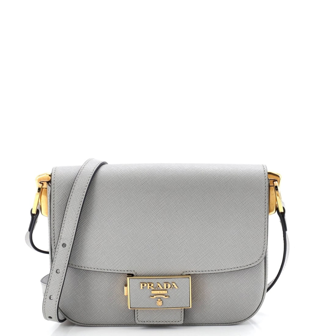 Embleme Prada Saffiano Leather Small Bag Flap: Embleme Prada Saffiano Leather Small Bag Flap The Prada Embleme Flap Bag in Saffiano Leather is a stylish small shoulder bag with a classic flap design. Measuring just 5.5" tall and 8" wide, it