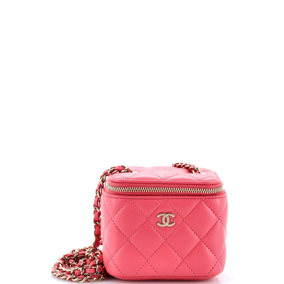 Vanity Case in Classic Lambskin Quilted with Chain from Chanel: Vanity Case in Classic Lambskin Quilted with Chain from Chanel Pink Leather Mini Vanity Case with Chain from Chanel, featuring classic quilted design and gold tone hardware. Measuring 3.5" x 4" x 3", 