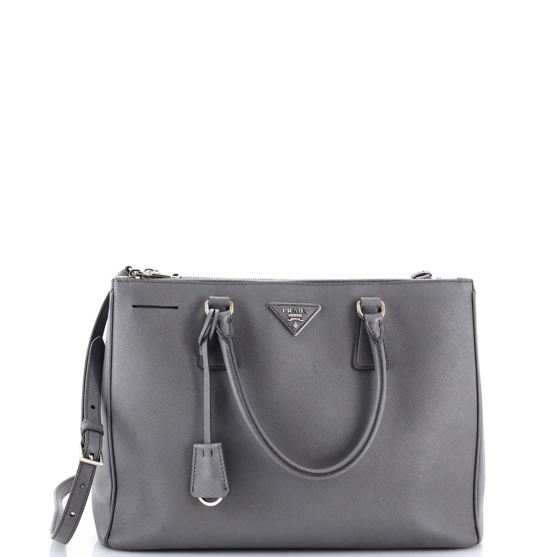 Saffiano leather double zip medium Prada tote Lux: Saffiano leather double zip medium Prada tote Lux Saffiano leather, a signature Prada material, adorns the exterior of this medium double zip tote. The classic design features a gray exterior with min
