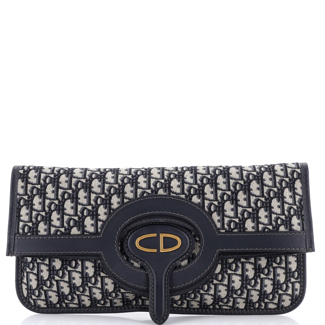 Christian Dior Fold Over Oblique Canvas: Christian Dior Fold Over Oblique Canvas The Christian Dior Fold Over Oblique Canvas clutch boasts a striking blue canvas exterior with elegant aged gold hardware, adding a touch of sophistication to