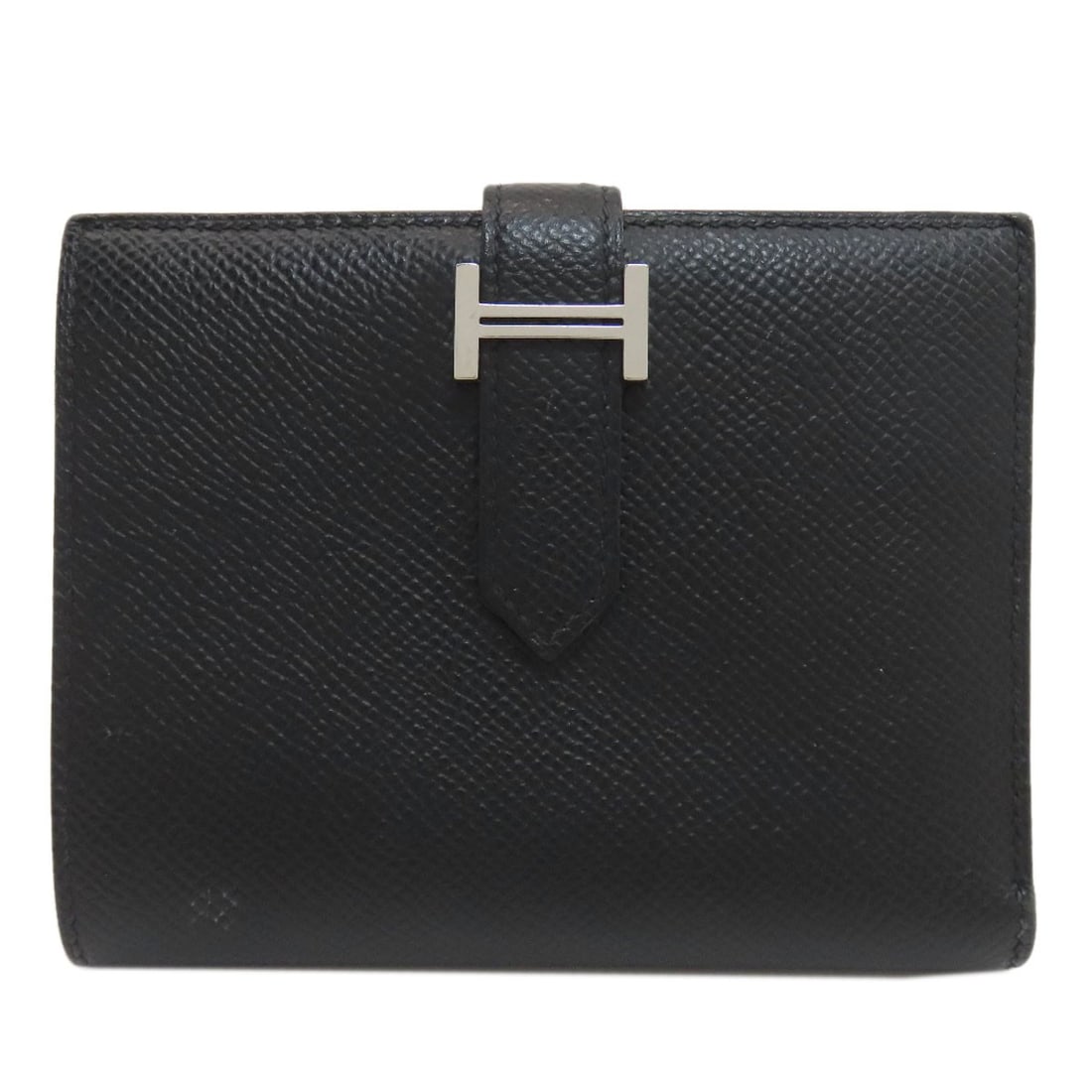 Hermes Bearn Compact Silverhardware Bifold Wallet With Coin Pocket Epsom: Hermes Bearn Compact Silverhardware Bifold Wallet With Coin Pocket Epsom Black Epsom Bifold Wallet with Coin Pocket features silver hardware, making it a stylish and functional accessory. The compact 