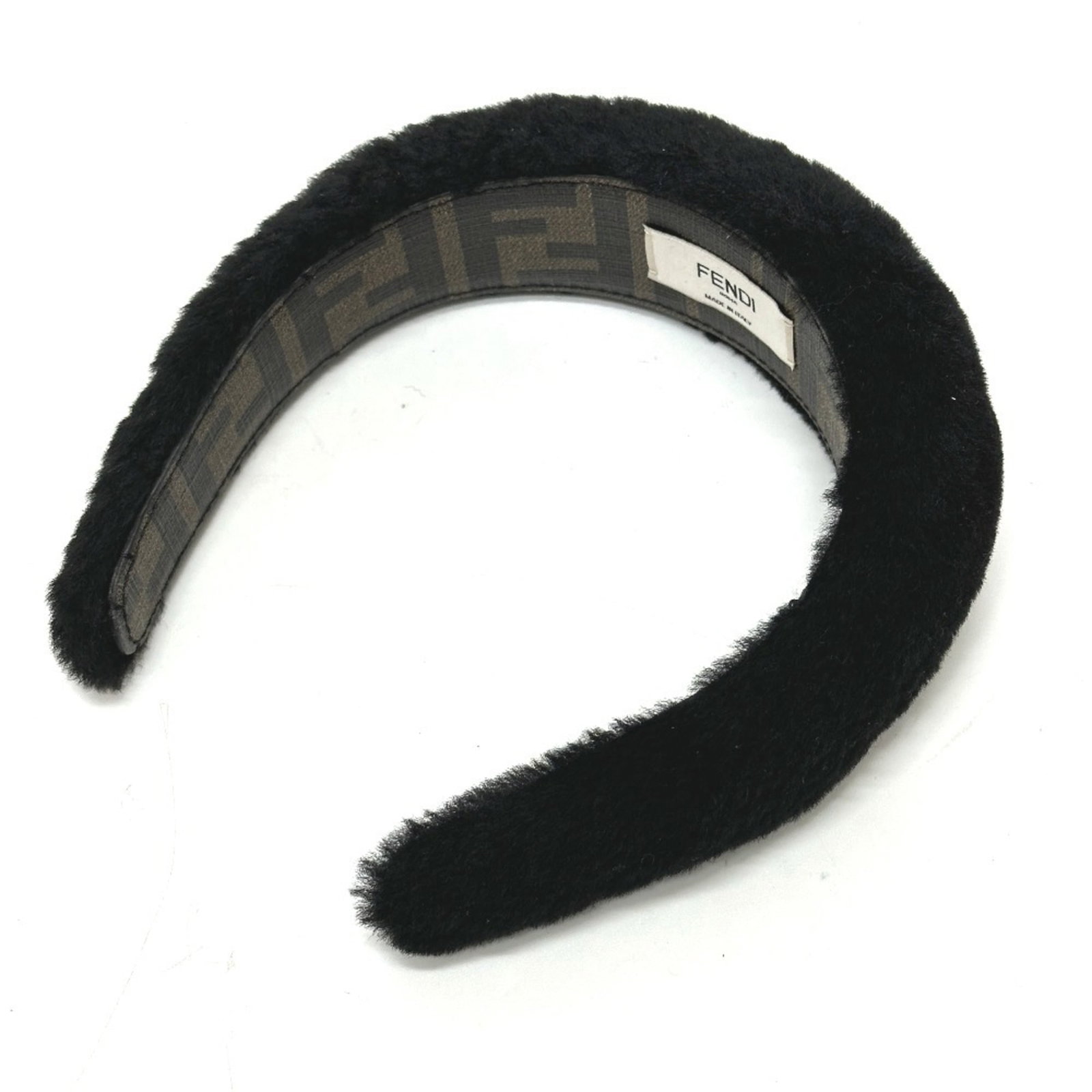 Fur Headband By Fendi: Fur Headband By Fendi Fur Headband by Fendi, crafted from luxurious fur, boasts a sleek black design. Measuring 4cm in length and 1.57'' in width, this headband adds a touch of sophistication to any