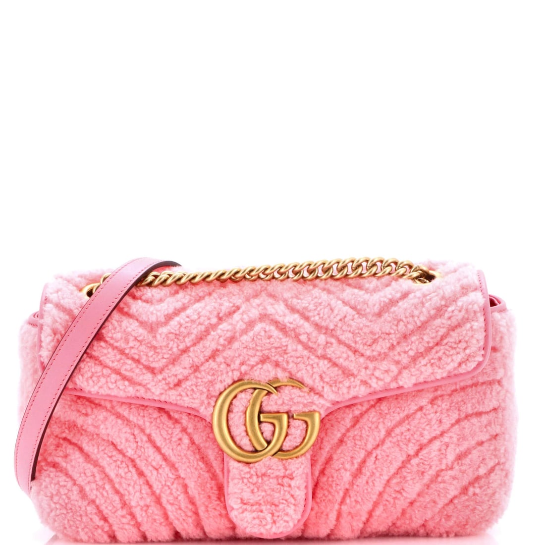Marmont Matelasse Flap Shearling Bag Small Gucci GG: Marmont Matelasse Flap Shearling Bag Small Gucci GG Small Marmont Matelasse Flap Shearling Bag in Pink from Gucci's GG Collection. This stylish shoulder bag features shearling exterior, pink interior,