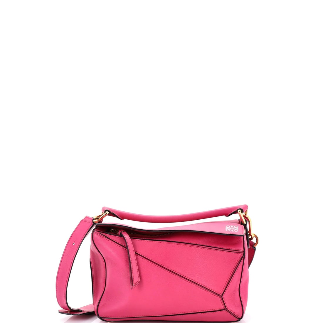 Leather bag puzzle small Loewe: Leather bag puzzle small Loewe Small Loewe Puzzle Bag in Pink Leather. This small satchel features a pink leather exterior with heavy edge wear and minor cracking, as well as scuffs on the handles and