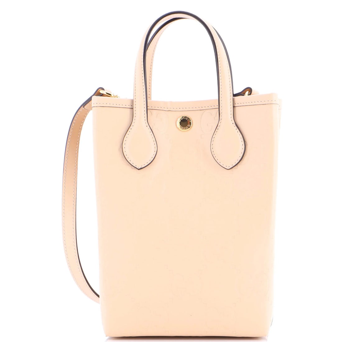 Gucci Vertical Embossed Leather Tote Mini GG: Gucci Vertical Embossed Leather Tote Mini GG Mini GG Vertical Embossed Leather Tote from Gucci, featuring a neutral exterior with vertical embossing and gold hardware. This mini tote measures 9"