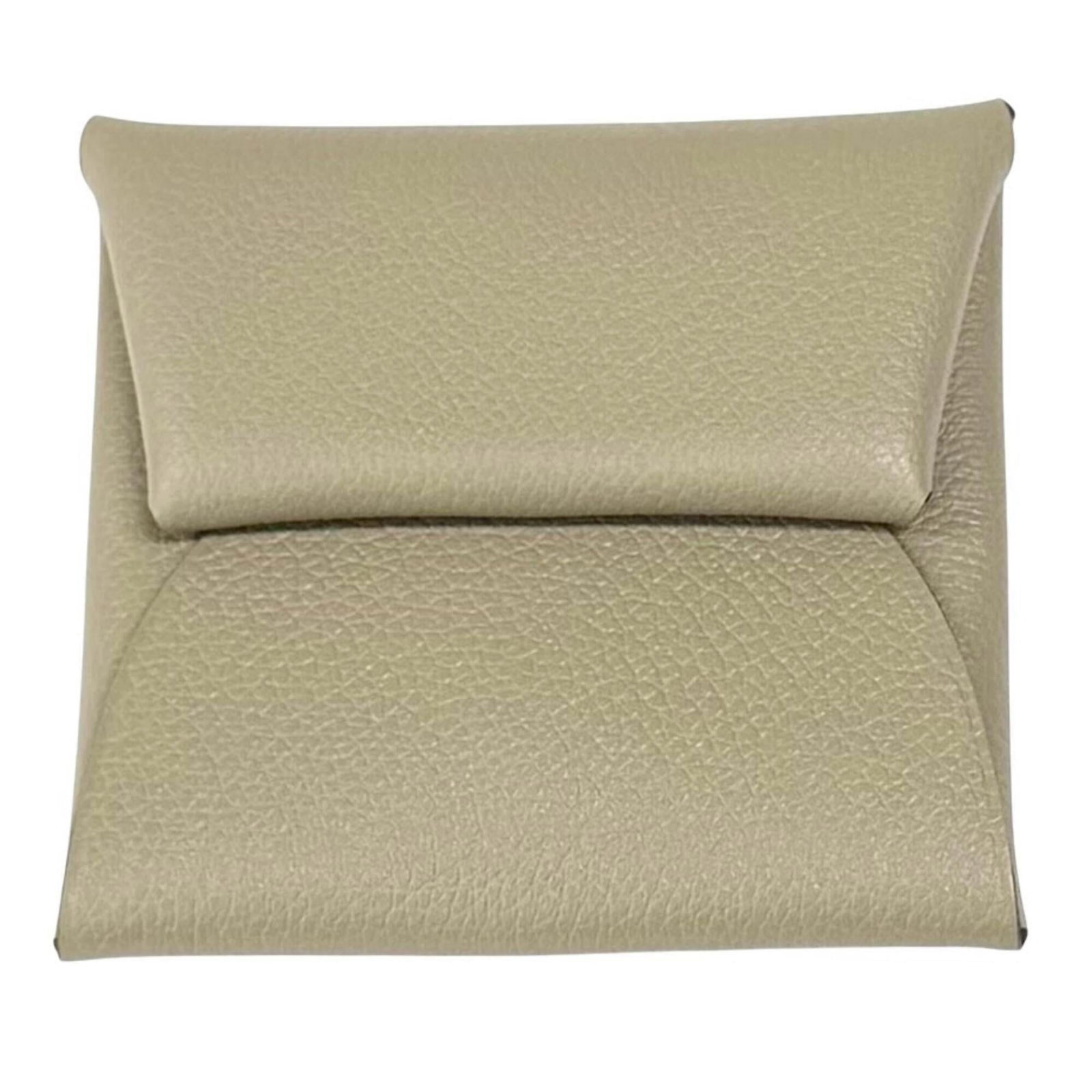 Hermes Coin Purse/ Coin Case Evercalf Leather: Hermes Coin Purse/ Coin Case Evercalf Leather Evercalf leather craftsmanship meets timeless elegance in this classic Hermes Coin Purse, crafted from high-quality Beige Evercalf leather. Measuring just