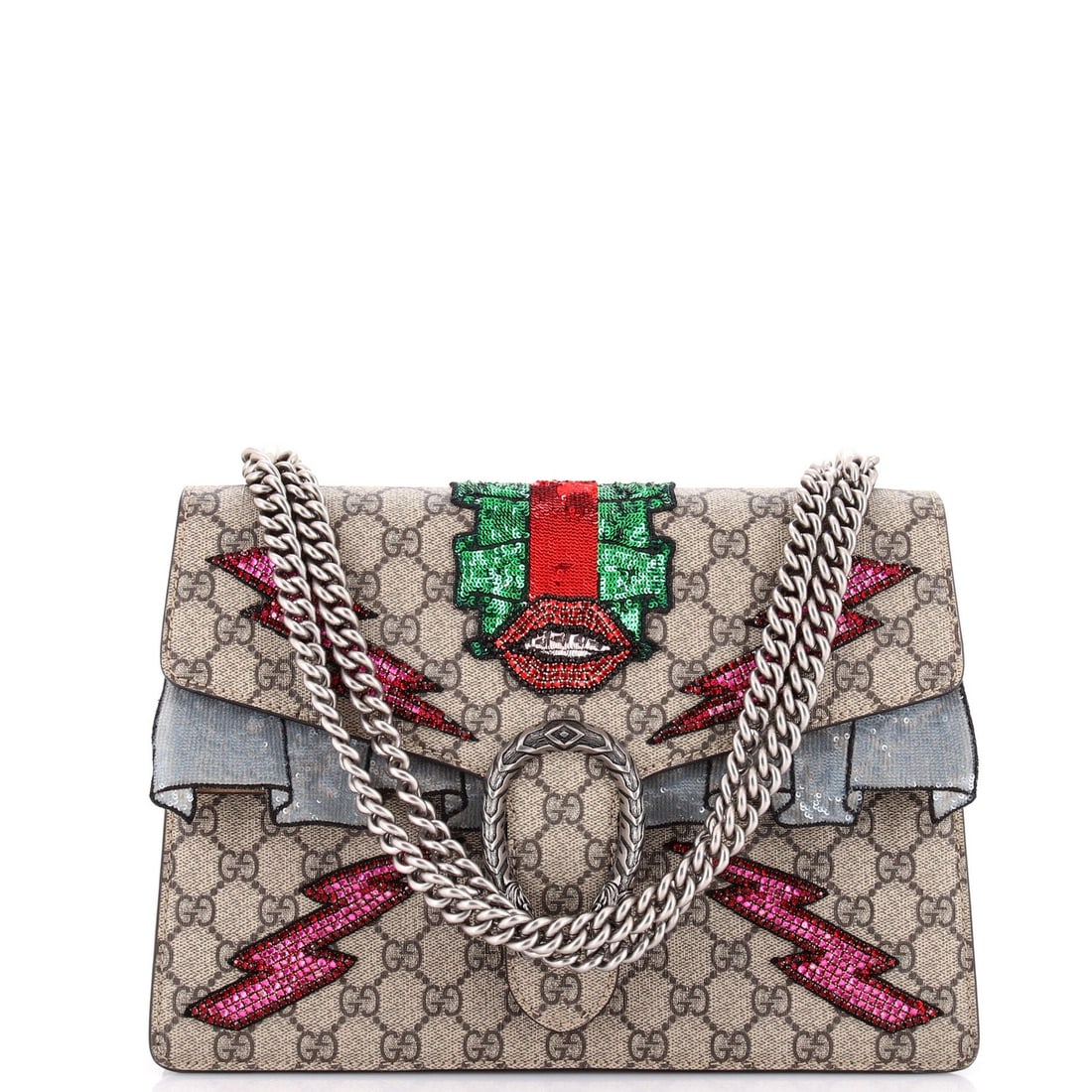 Gucci medium coated canvas bag embellished with GG: Gucci medium coated canvas bag embellished with GG The Gucci Dionysus bag boasts a striking brown canvas coated with sequins, adorned with the iconic GG logo. Its medium size and shoulder strap make