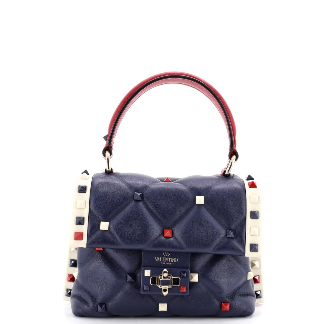 Garavani Candystud Top Leather Bag Handle Mini Valentino: Garavani Candystud Top Leather Bag Handle Mini Valentino This mini Valentino Garavani Candystud Top Handle leather bag features a striking blue exterior with gold tone hardware. With its compact size