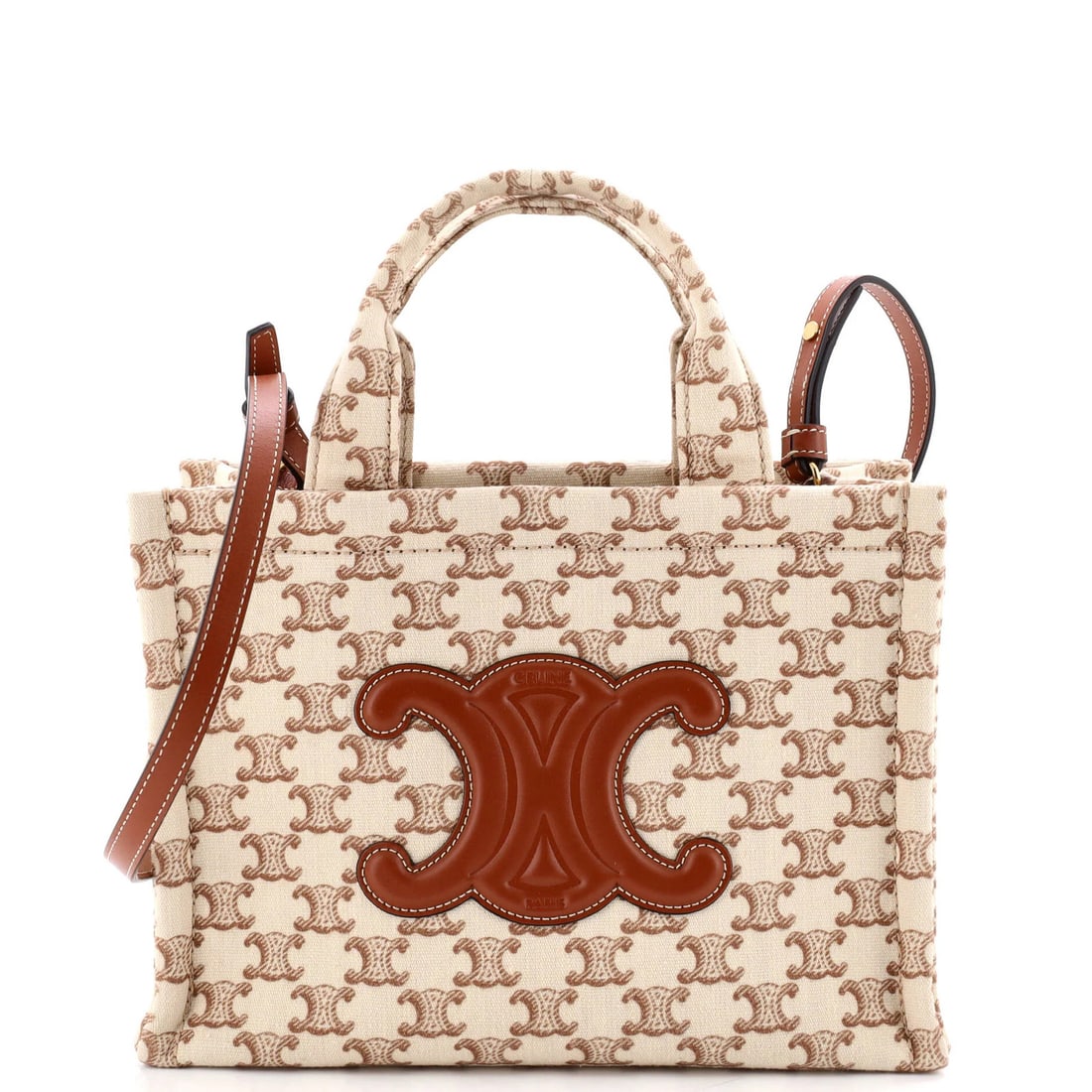 Celine Cabas Thais Tote Triomphe Printed Canvas Small: Celine Cabas Thais Tote Triomphe Printed Canvas Small The Celine Cabas Thais Tote Triomphe Printed Canvas Small boasts a timeless neutral exterior with a subtle canvas texture, complemented by a class
