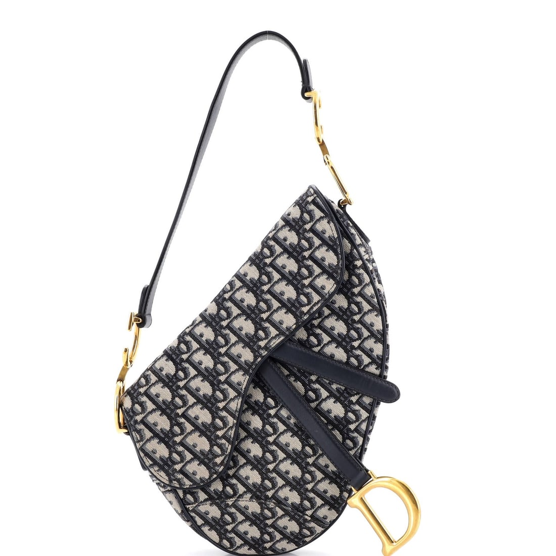 Christian Dior Saddle Handbag Oblique Canvas Medium: Christian Dior Saddle Handbag Oblique Canvas Medium The Christian Dior Saddle Handbag Oblique Canvas Medium boasts a striking blue canvas exterior with a timeless oblique design. Measuring medium in