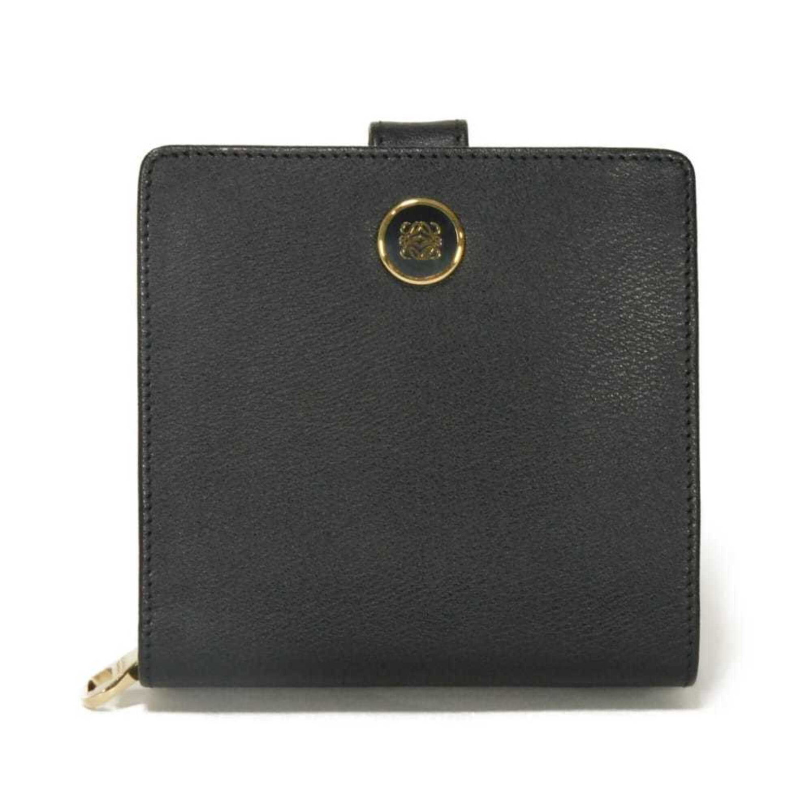 Leather bi fold wallet: Leather bi fold wallet Leather bi-fold wallet with sleek black design, measuring 10.5cm x 11cm x 4cm. Crafted from high-quality leather, this stylish accessory features a classic bi-fold layout perfec