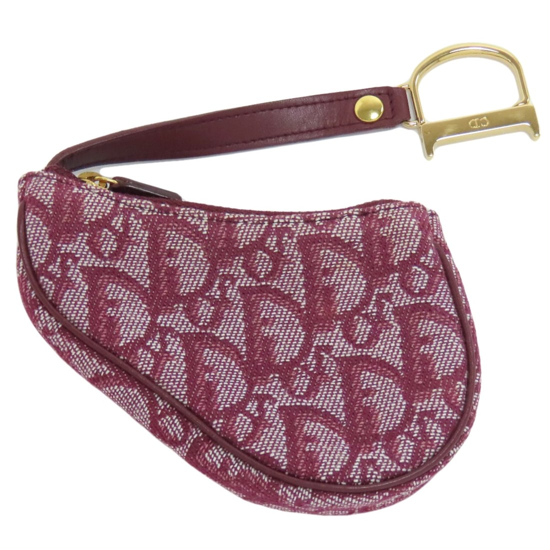 Christian Dior Coin Purse Canvas Pattern Saddle Trotter: Christian Dior Coin Purse Canvas Pattern Saddle Trotter Christian Dior's iconic Coin Purse design takes center stage in this vibrant red canvas pattern saddle trotter. The bold, eye-catching color