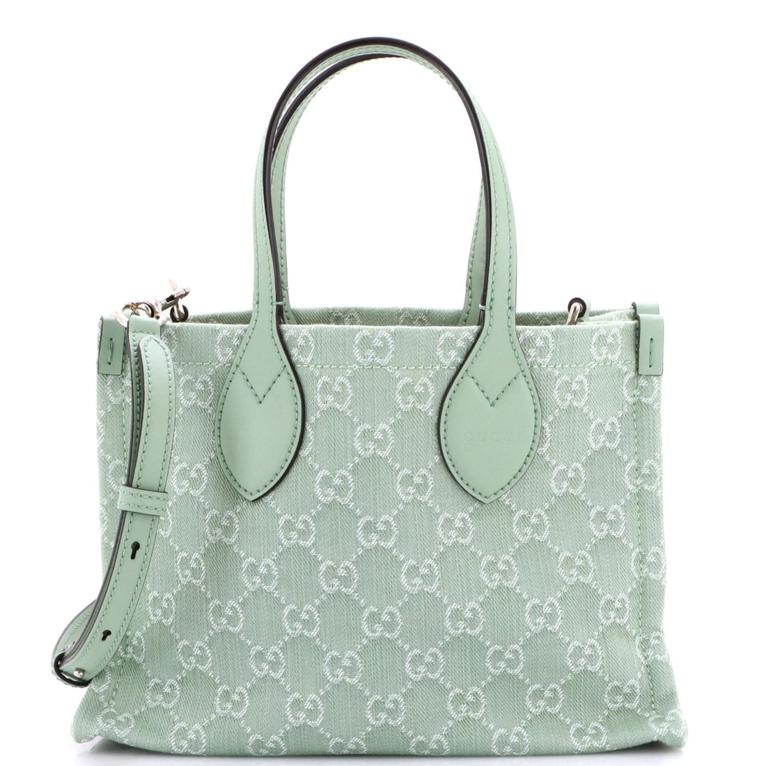 Ophidia Shopper Tote Gucci GG Medium Denim: Ophidia Shopper Tote Gucci GG Medium Denim The Gucci GG Medium Denim Ophidia Shopper Tote boasts a stylish green exterior and matching interior, perfect for daily errands or work. This medium-sized to