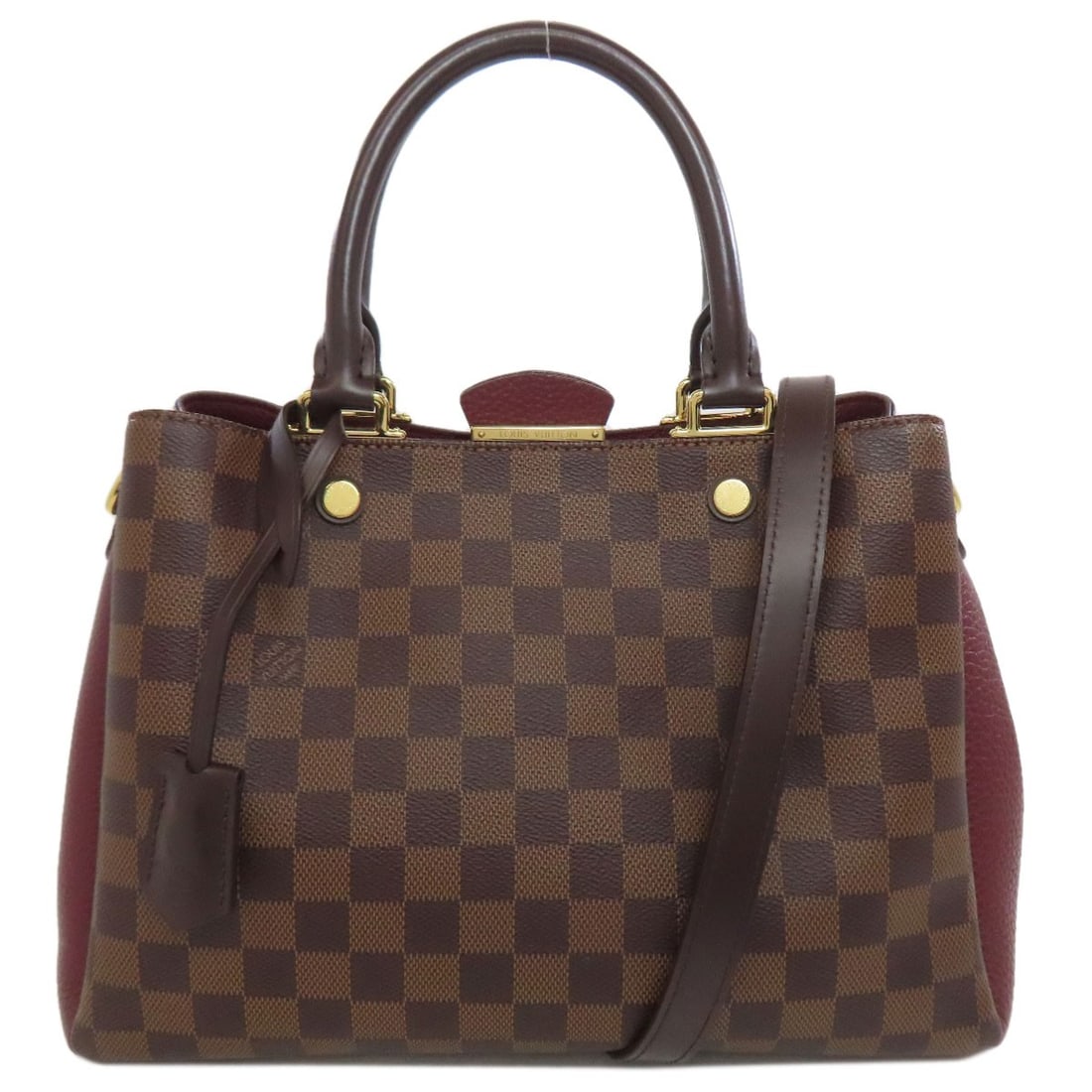 Handbag Brittany Damier Canvas Louis Vuitton N41675: Handbag Brittany Damier Canvas Louis Vuitton N41675 Brown Damier canvas handbag from LOUIS VUITTON, featuring the iconic N41675 style. This classic design showcases the signature pattern and timeless