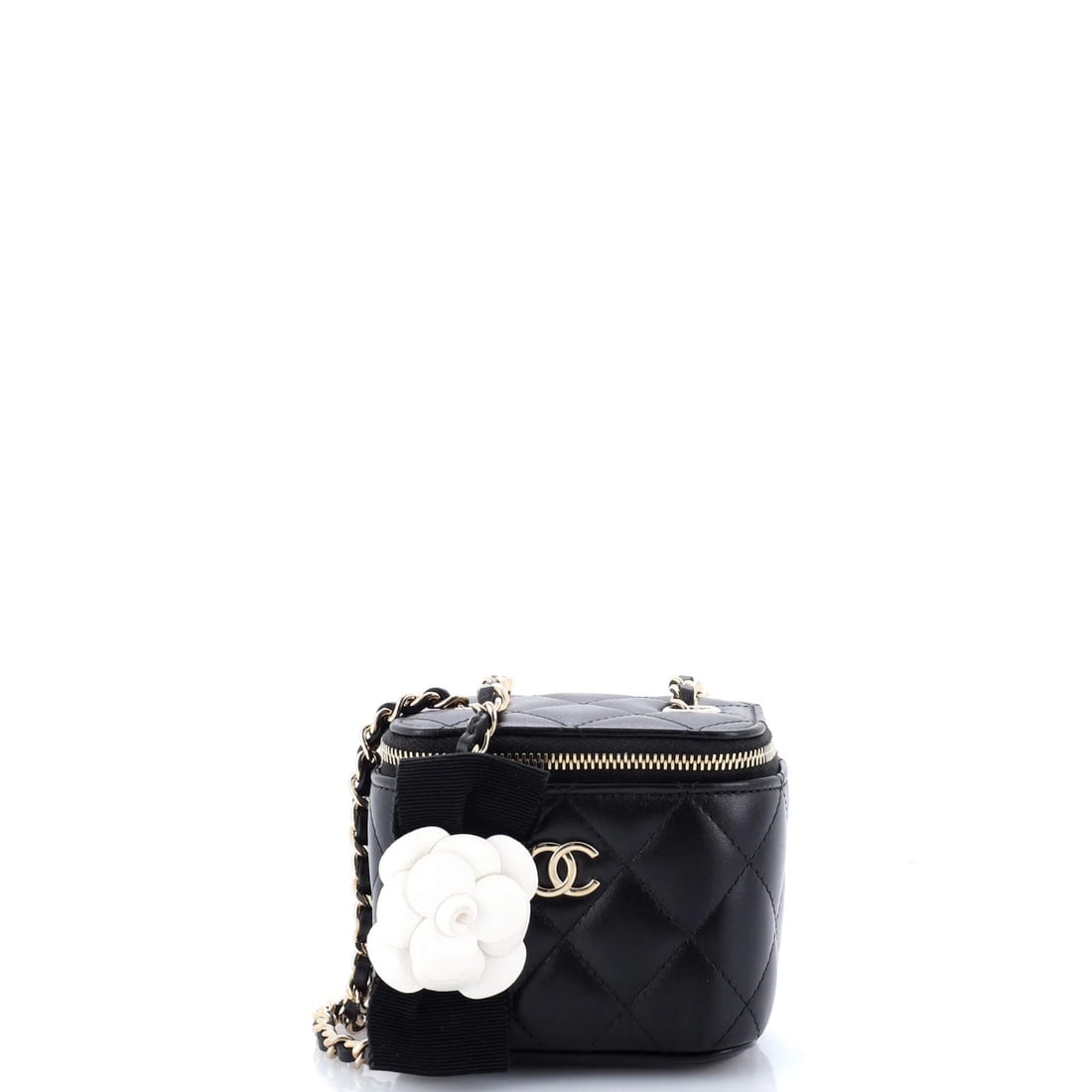 Camellia Bow Vanity Case Chain Lambskin Quilted Chanel Mini: Camellia Bow Vanity Case Chain Lambskin Quilted Chanel Mini Black quilted lambskin exterior, gold tone hardware, and a signature on the interior make this Camellia Bow Vanity Case stand out. This