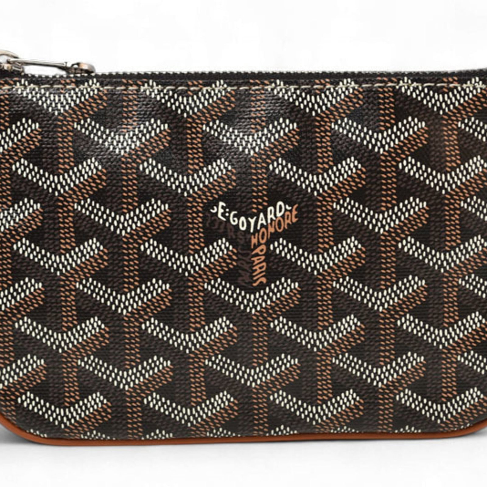 Canvas Leather Pouch Coated Goyard: Canvas Leather Pouch Coated Goyard Canvas Leather Pouch Coated Goyard in Black. This sleek, black leather pouch features coated canvas and calfskin details, with a silver hardware accent. Comes with a