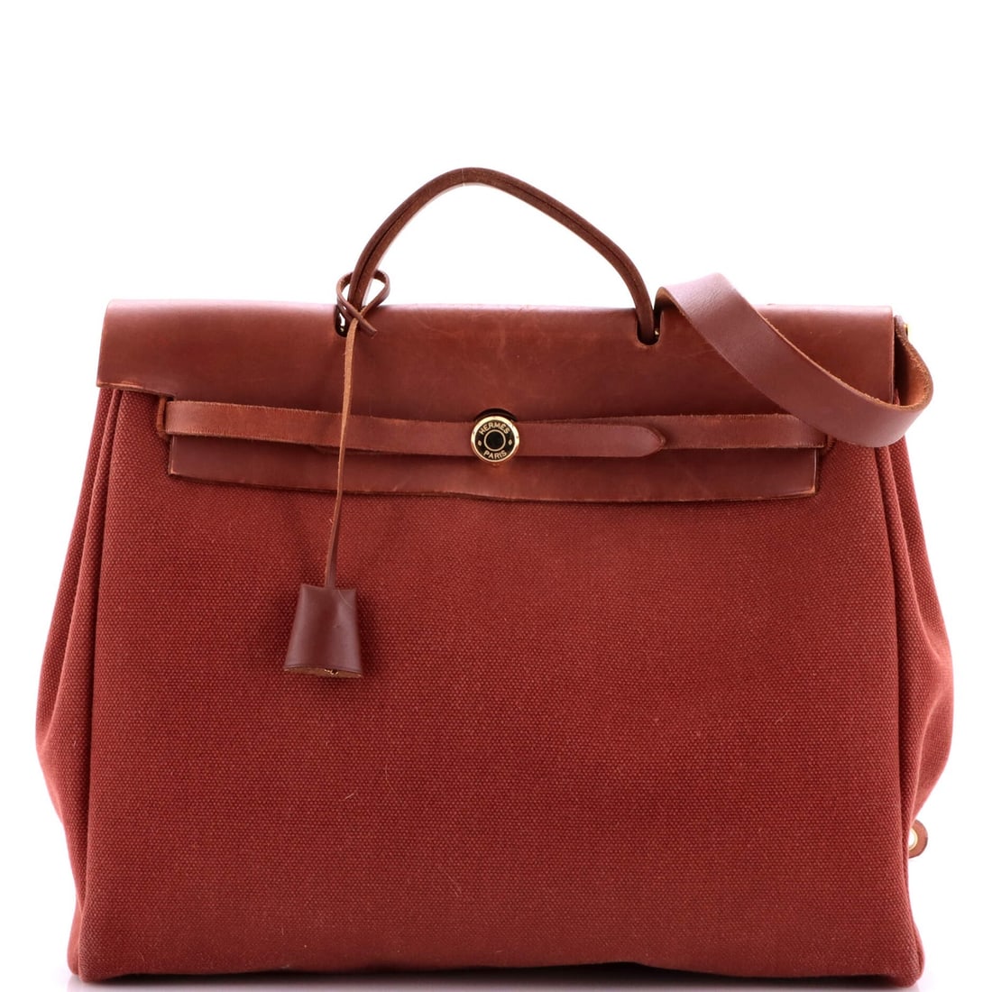 Hermes Herbag Zip Leather and Toile 39: Hermes Herbag Zip Leather and Toile 39 Brown Herm?s Herbag Zip Leather and Toile 39 with lock, keys, clochette, pochette, and strap. This classic handbag features a timeless design with edge wear and 