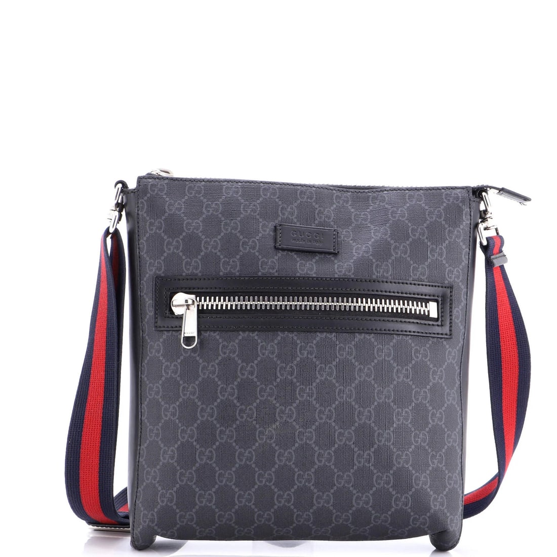 Gucci medium bag with canvas front zip and web strap messenger bag: Gucci medium bag with canvas front zip and web strap messenger bag Canvas Gucci medium bag with cross body design, featuring black exterior and silver hardware. This web strap messenger bag boasts a c