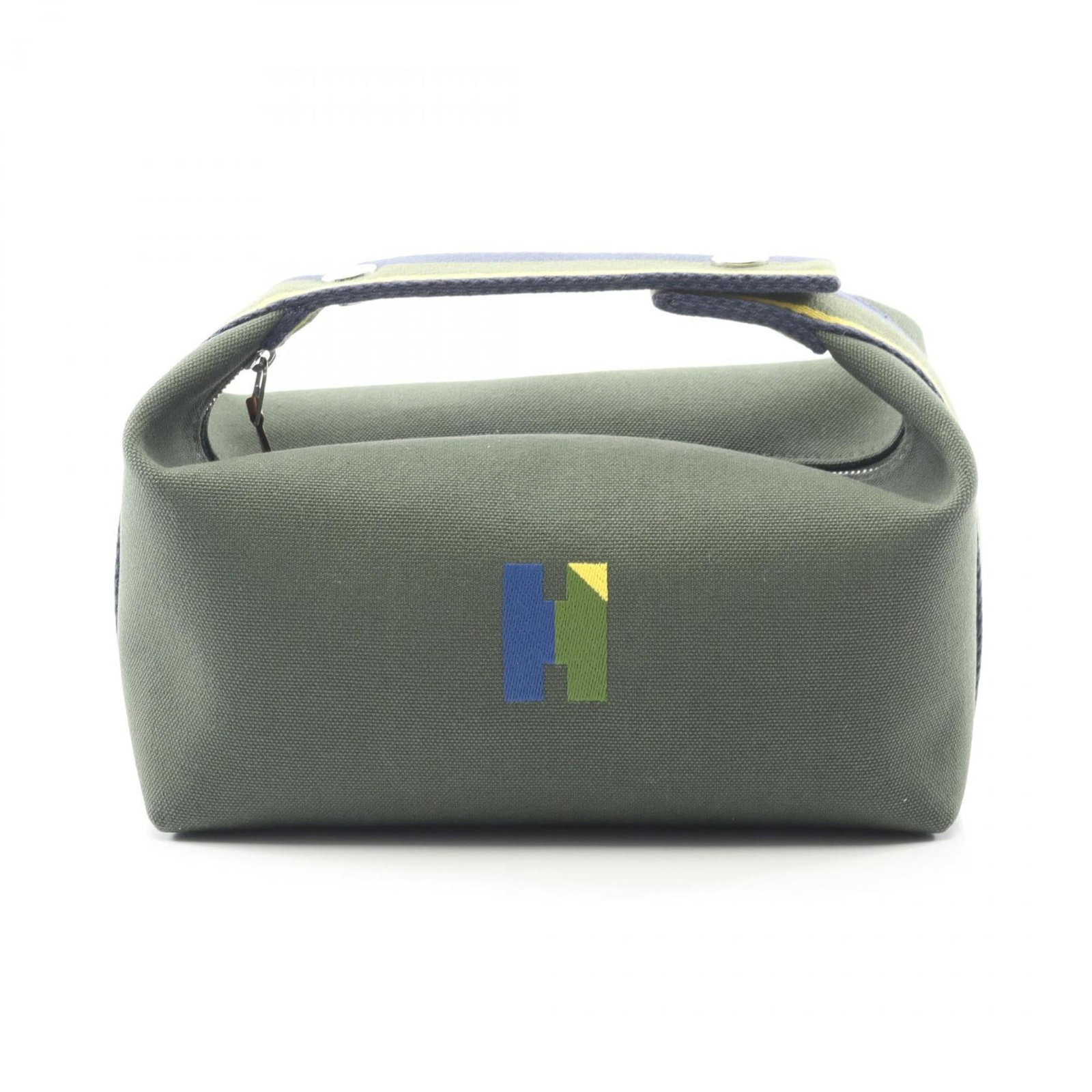 Handbag of Hermes: Handbag of Hermes Canvas handbag from Hermes features a unique green and multi-color design, complemented by navy accents. The bag measures 10cm x 21cm x 13cm in size. This canvas handbag is made