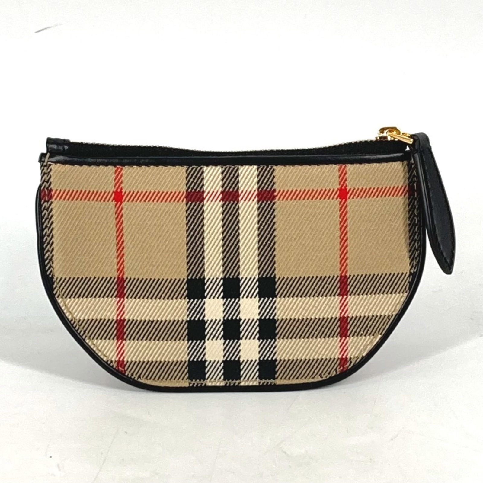 Burberry Coin Purse/ Coin Case Leather Canvas: Burberry Coin Purse/ Coin Case Leather Canvas Burberry Coin Purse/ Coin Case Leather Canvas features a classic design with beige color and durable leather canvas material. The compact size, measuring
