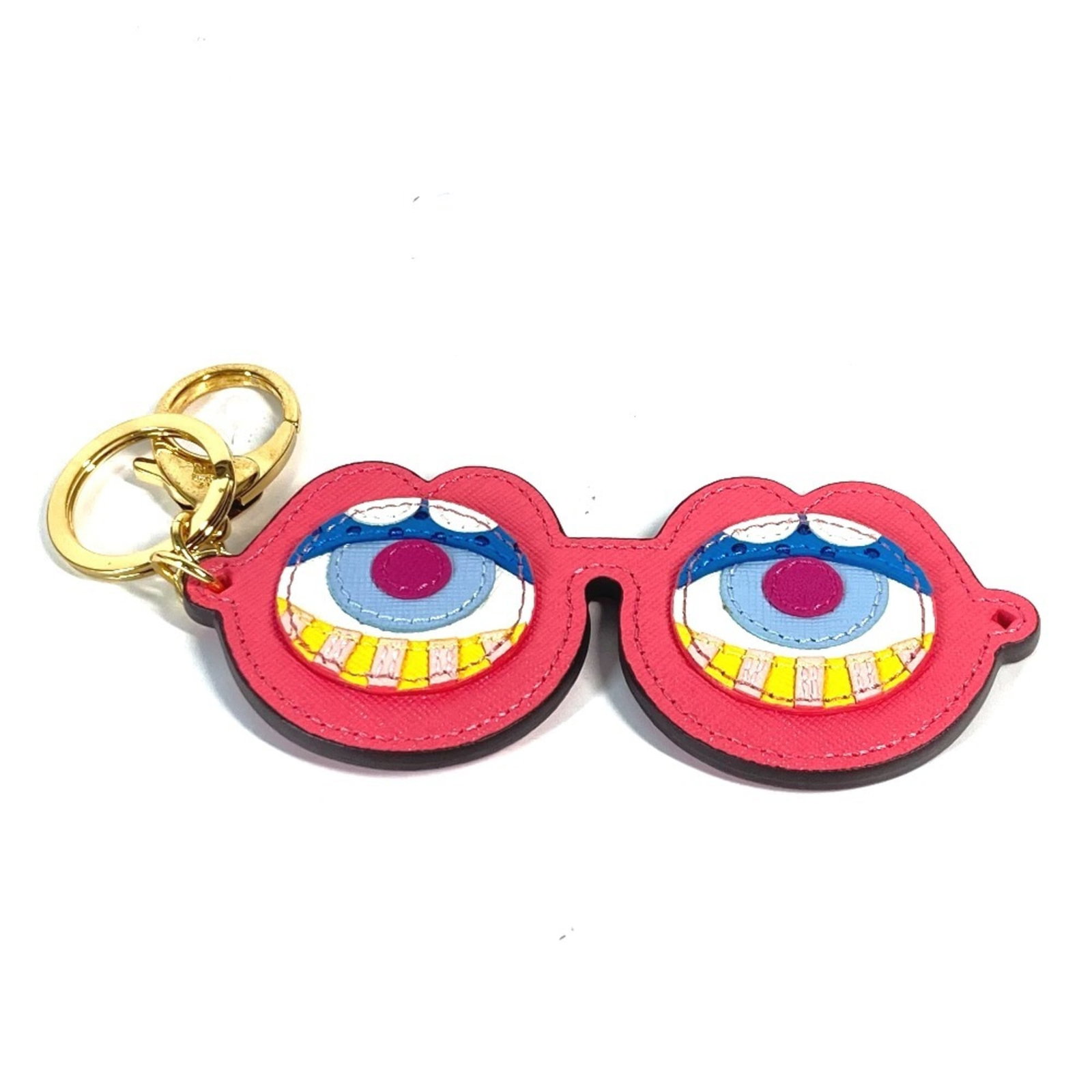 Leather keyring McM: Leather keyring McM Pink leather keyring, packaged with a box and dust bag. This accessory showcases the brand's signature style with its distinctive color choice. The keyring itself is made from high