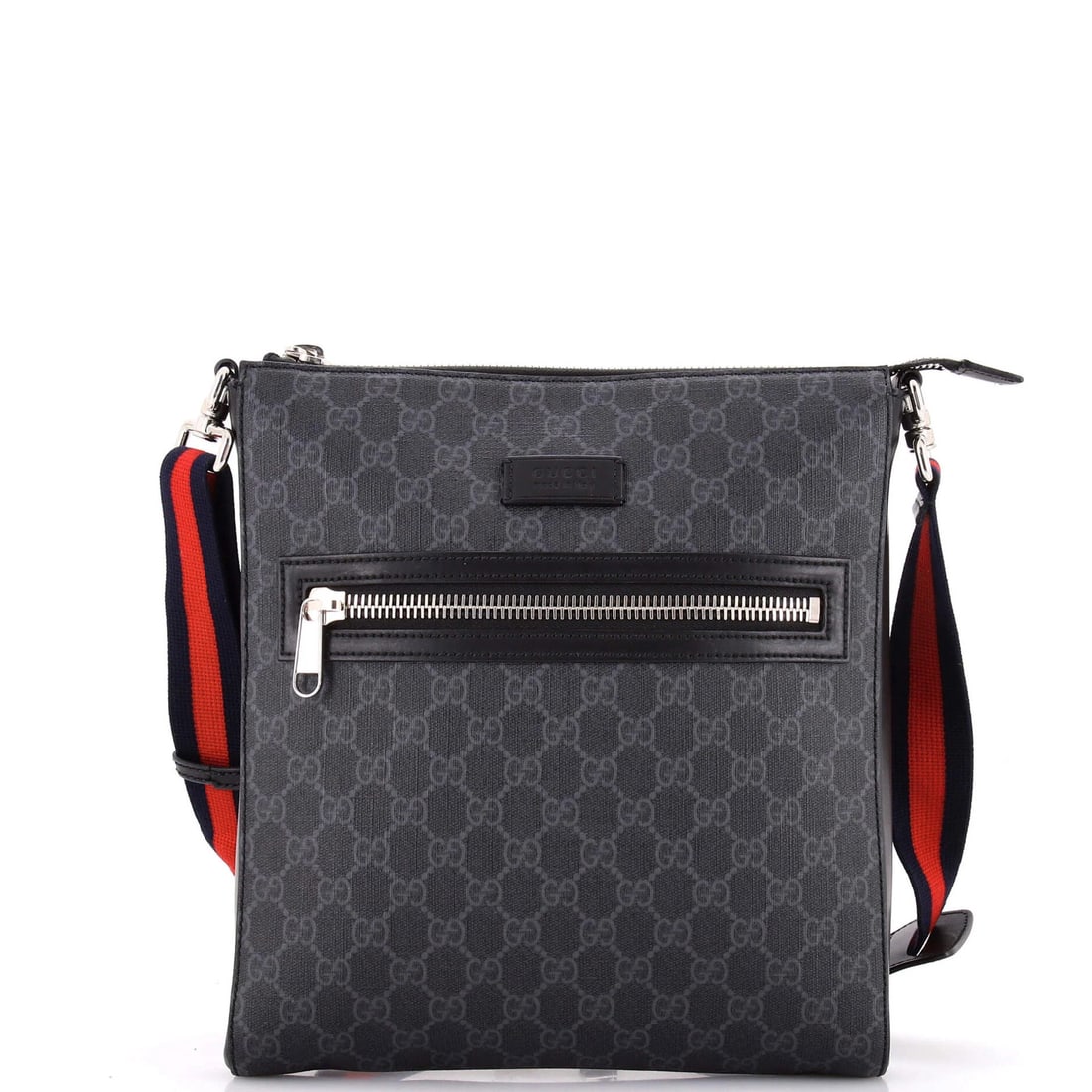 Gucci medium bag with canvas front zip and web strap messenger bag: Gucci medium bag with canvas front zip and web strap messenger bag Canvas Gucci medium bag with cross body design, featuring black exterior and silver hardware. This web strap messenger bag boasts a c