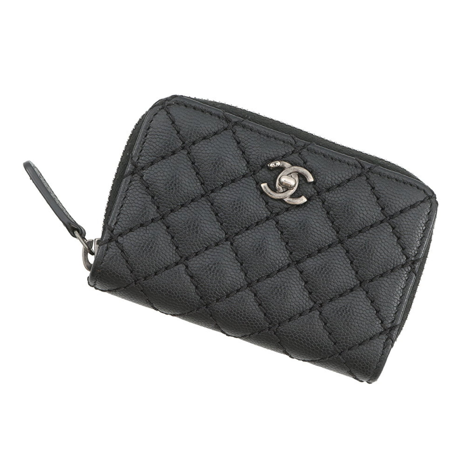 Chanel Coin Purse/ Coin Case Grained Calfskin: Chanel Coin Purse/ Coin Case Grained Calfskin Grained Calfskin Coin Purse from Chanel, crafted in Italy. This sleek black coin case boasts a classic design and premium materials, measuring 7.5cm x