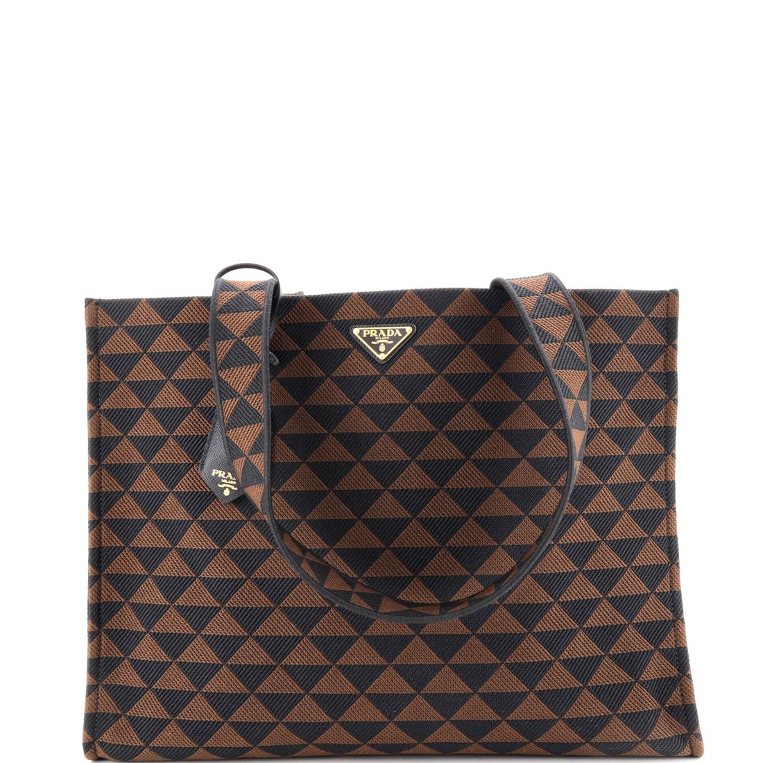Jacquard Horizontal Symbole Shopper Tote Prada: Jacquard Horizontal Symbole Shopper Tote Prada Brown canvas Prada Symbole Shopper Tote with gold hardware, featuring a horizontal jacquard design. Measures 13" x 17" x 6.5". In excellent condition