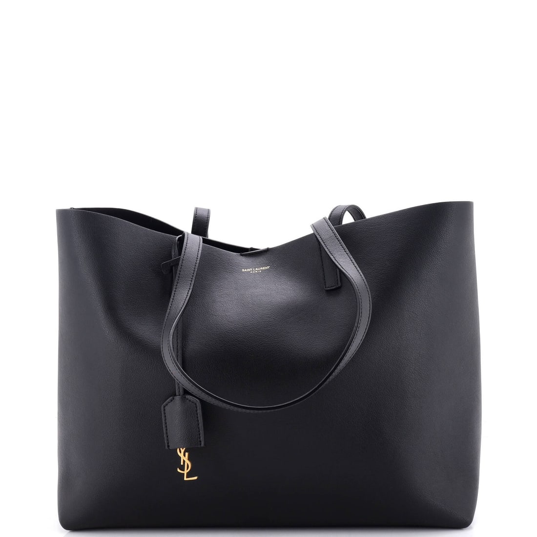 Large leather tote shopper from Saint Laurent: Large leather tote shopper from Saint Laurent Large Saint Laurent Leather Tote Shopper in Black. This spacious tote features heavy-duty leather construction, gold hardware, and a classic shopper