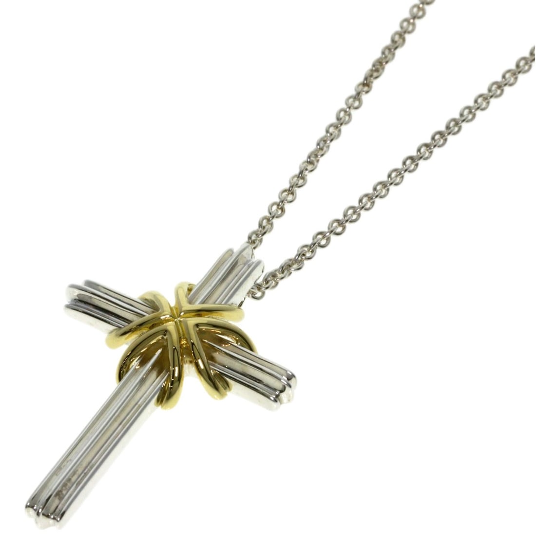 Tiffany Co Signature Cross Necklace in 18k Yellow Gold: Tiffany Co Signature Cross Necklace in 18k Yellow Gold The Tiffany Co Signature Cross Necklace in 18k Yellow Gold boasts a sleek design, featuring a signature from the renowned brand. Made from
