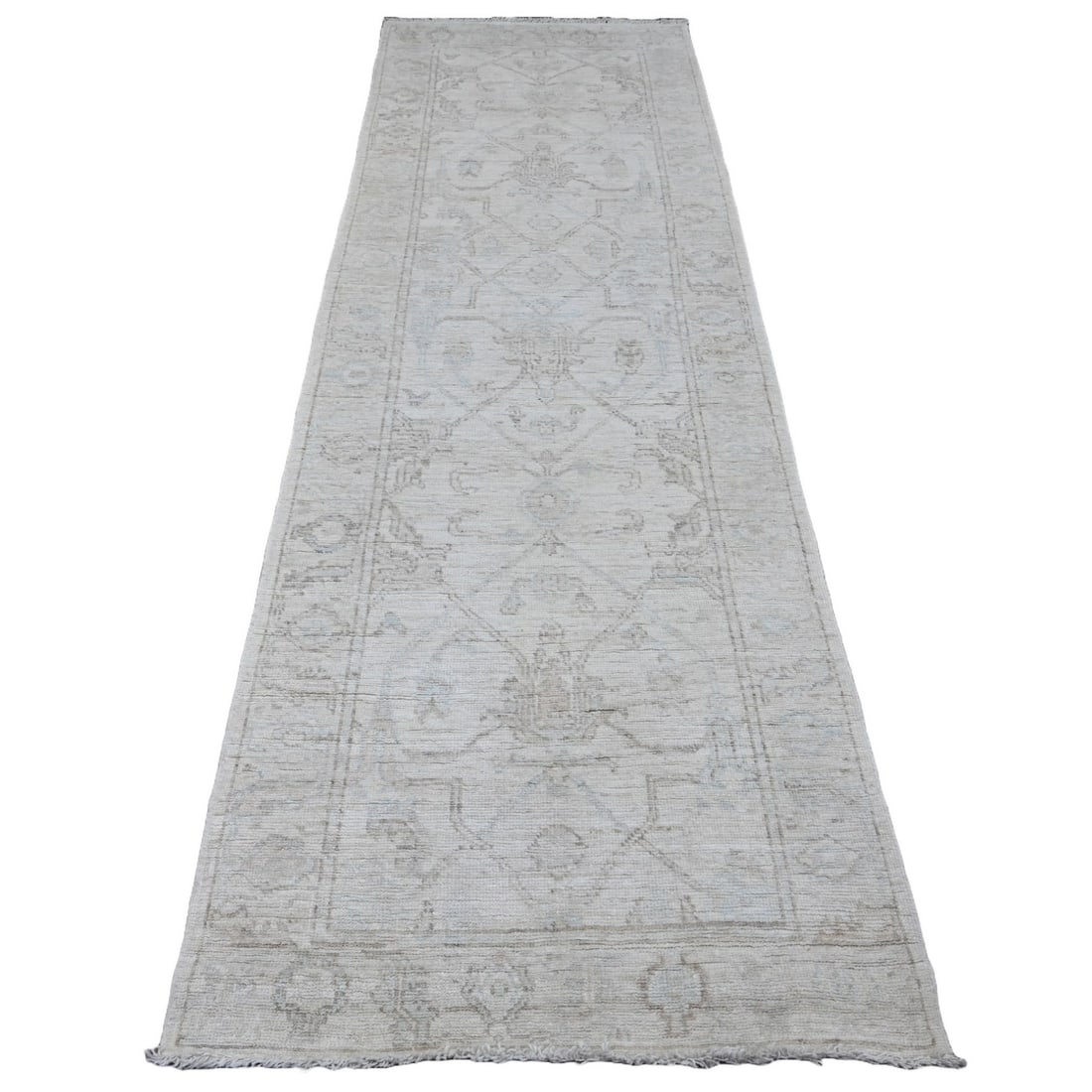 3'x9'5" White Hand Knotted Afghan Angora Oushak Vines Design All Wool Rug: 3'x9'5" White Hand Knotted Afghan Angora Oushak Vines Design All Wool Rug This stunning Oushak-style rug boasts an intricate vines design in soft ivory hues, set against a rich brown and blue