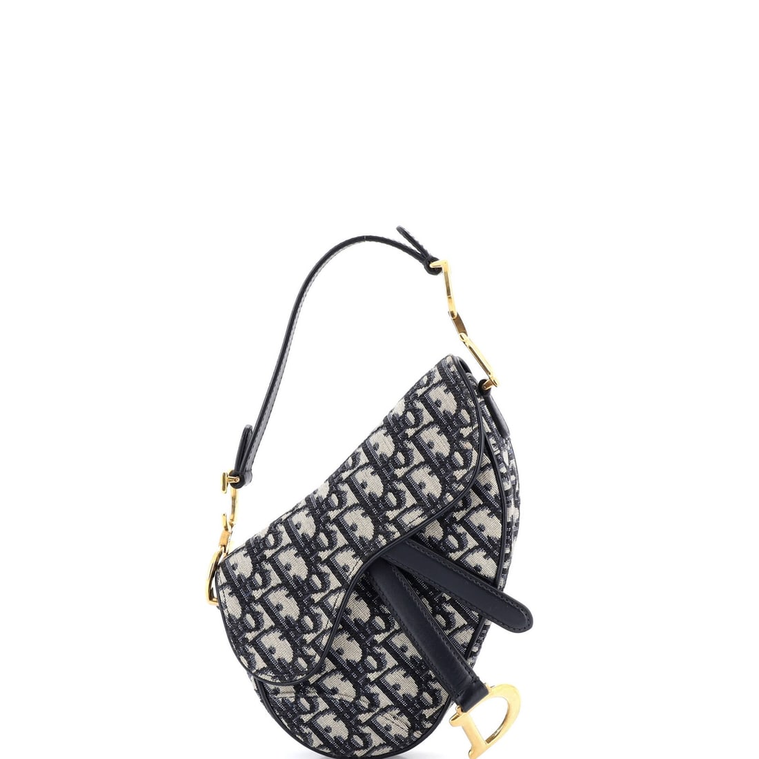 Handbag Saddle Canvas Oblique Dior Christian Mini: Handbag Saddle Canvas Oblique Dior Christian Mini The Christian Dior Saddle Canvas Oblique Mini Handbag features a striking blue canvas exterior with an oblique design, classic shoulder straps, and ne