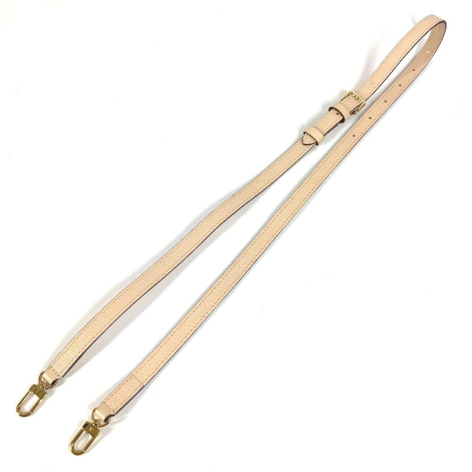 Louis Vuitton Strap Leather: Louis Vuitton Strap Leather Strap made from genuine Louis Vuitton leather, available in beige color. Measuring 102.5cm x 1.5cm / 40.35'' x 0.59'', it offers a classic design element for those looking