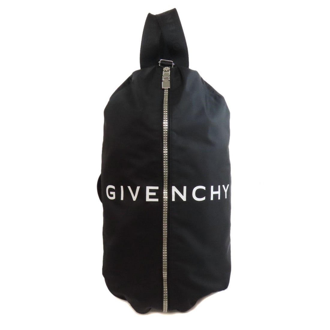 Nylon daypack Givenchy 2way backpack: Nylon daypack Givenchy 2way backpack Black nylon daypack from Givenchy with a sleek 2-way design. Made from durable nylon, this backpack features a classic black exterior that exudes understated style