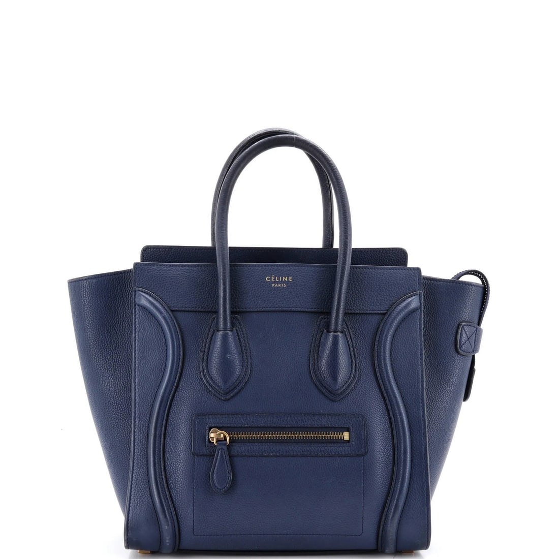 Luggage Bag Grainy Leather Celine Micro: Luggage Bag Grainy Leather Celine Micro The Celine Grainy Leather Micro Luggage Bag features a distinctive grainy leather exterior in blue, with suede interior and aged gold hardware. Noted for its