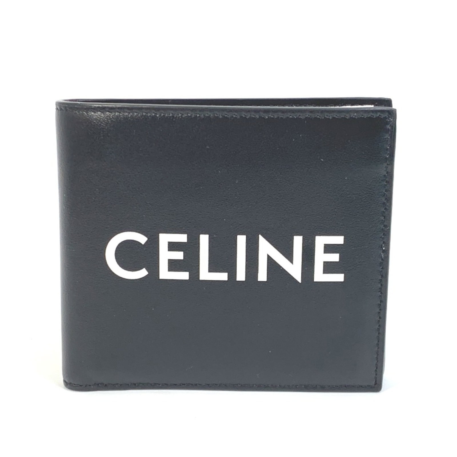 Leather wallet bi-fold Celine: Leather wallet bi-fold Celine Black leather bi-fold wallet from Celine, measuring 11cm x 10cm x 2.5cm. This sleek and stylish wallet features high-quality leather construction with a classic design th