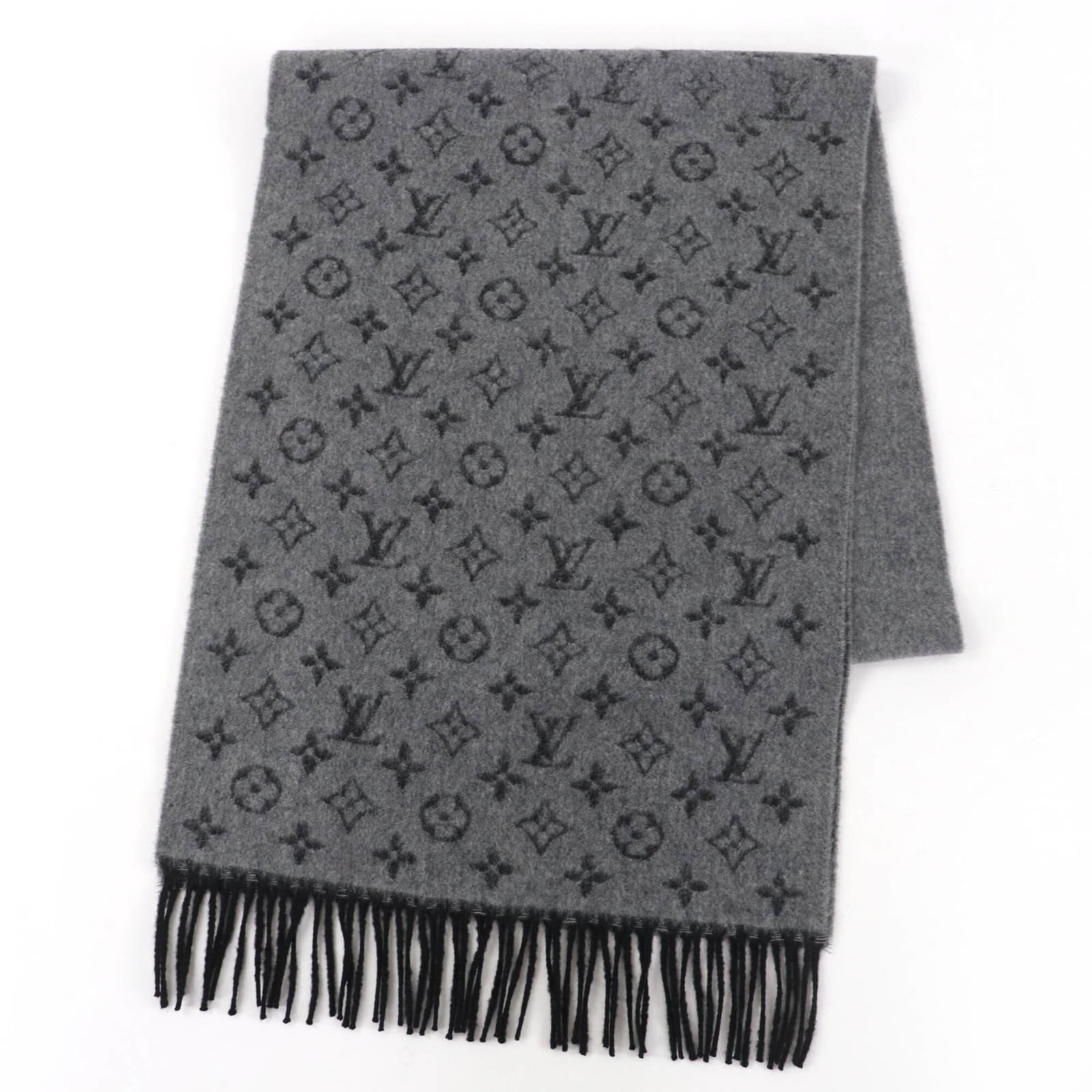 Cashmere Shawl Louis Vuitton: Cashmere Shawl Louis Vuitton Cashmere Shawl Louis Vuitton - A luxurious black shawl with subtle gray undertones, crafted from the finest cashmere and wool blend. Measuring 1.84m x 37cm in size, this e