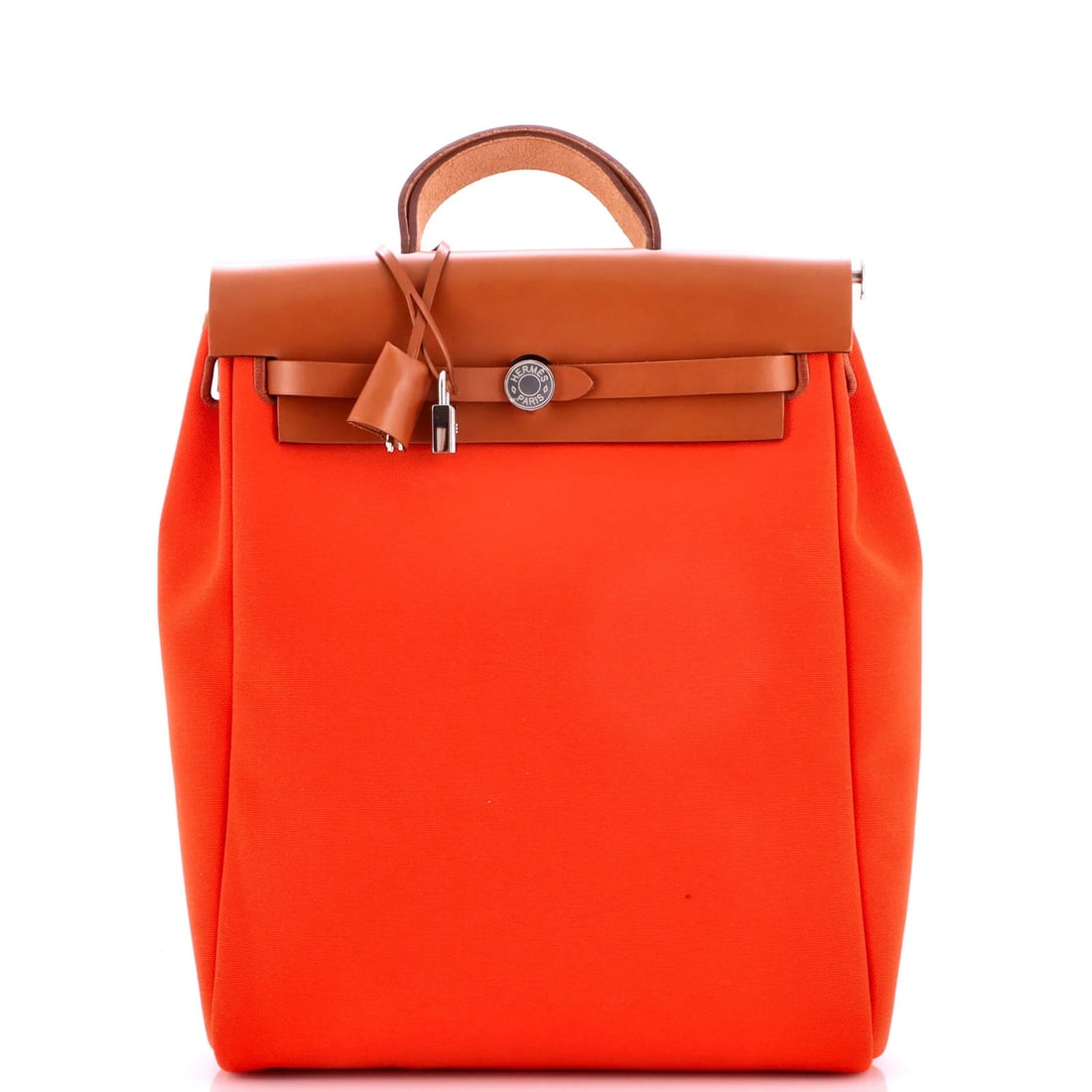 Hermes Leather Herbag Backpack Dos Zip Toile A: Hermes Leather Herbag Backpack Dos Zip Toile A Orange Herm?s Leather Herbag Backpack Dos Zip Toile A features a vibrant exterior with minor scuffs and edging, showcasing the iconic brand's design.