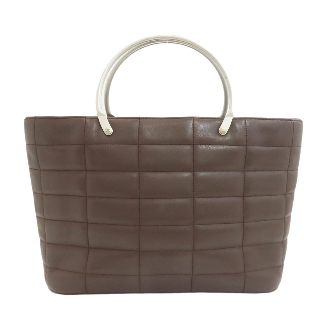 Chanel Choco Bar Silverhardware Handbag Calf: Chanel Choco Bar Silverhardware Handbag Calf Brown Calf Handbag with Silver Hardware from CHANEL. This classic handbag boasts elegant brown calf leather exterior and sophisticated silver hardware