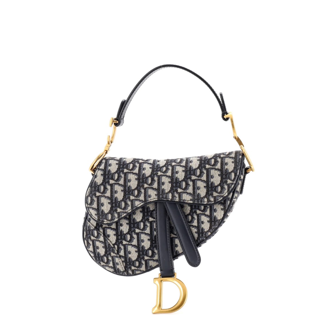 Handbag Saddle Canvas Oblique Dior Christian Mini: Handbag Saddle Canvas Oblique Dior Christian Mini The Christian Dior Saddle Canvas Oblique Mini Handbag features a striking blue canvas exterior with an oblique design, classic shoulder straps, and