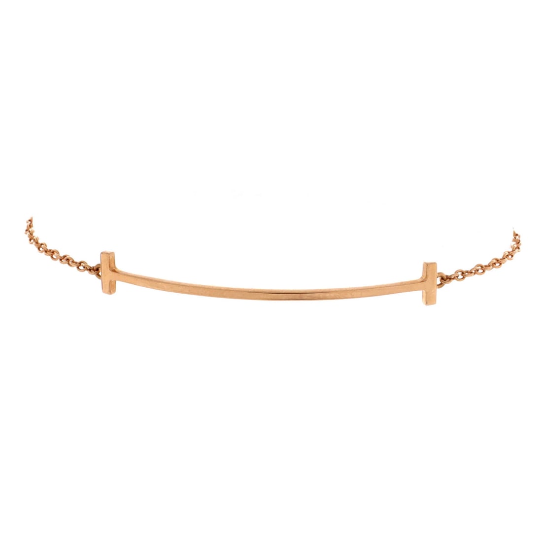 Tiffany & Co. T Smile Chain Bracelet 18K Rose Gold Medium: Tiffany & Co. T Smile Chain Bracelet 18K Rose Gold Medium Tiffany & Co.'s T Smile Chain Bracelet in 18K Rose Gold is a timeless piece. This medium-sized chain bracelet boasts an elegant design, showca