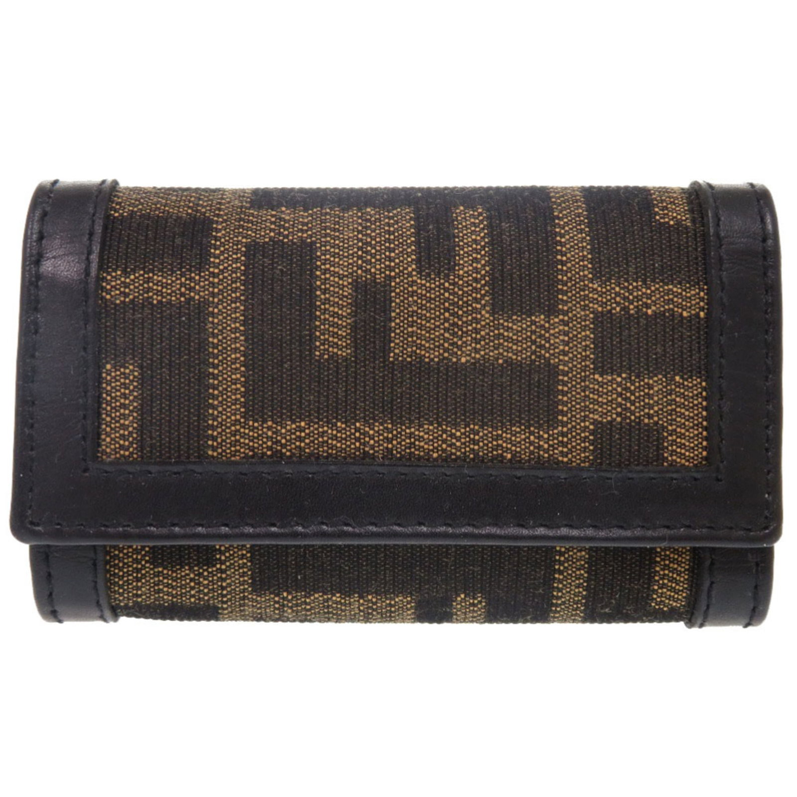 Keycase Leather by Fendi: Keycase Leather by Fendi Keycase Leather by Fendi features a rich brown color and combines canvas and leather materials. The compact size, measuring 6cm x 9.5cm x 1.5cm, makes it a convenient