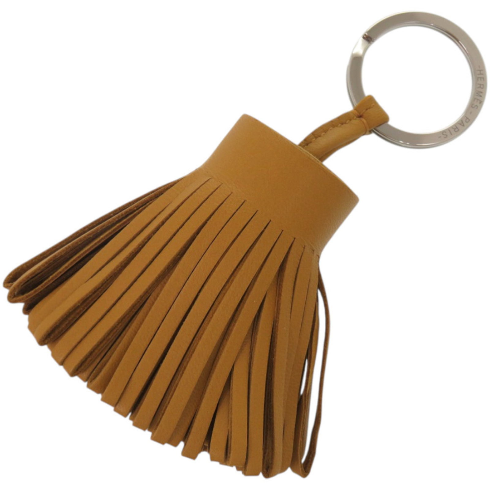 Hermes Keyring Agneau Milo: Hermes Keyring Agneau Milo Agneau Milo, a luxurious material from Herm?s, is used to craft this elegant keyring. Its brown hue and refined dimensions make it a sophisticated accessory for everyday use