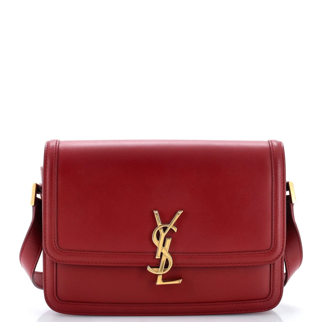 Leather medium bag by Saint Laurent: Leather medium bag by Saint Laurent The Saint Laurent Solferino medium bag boasts a striking red exterior made from high-quality leather, featuring scuffs and minor creases that add to its unique
