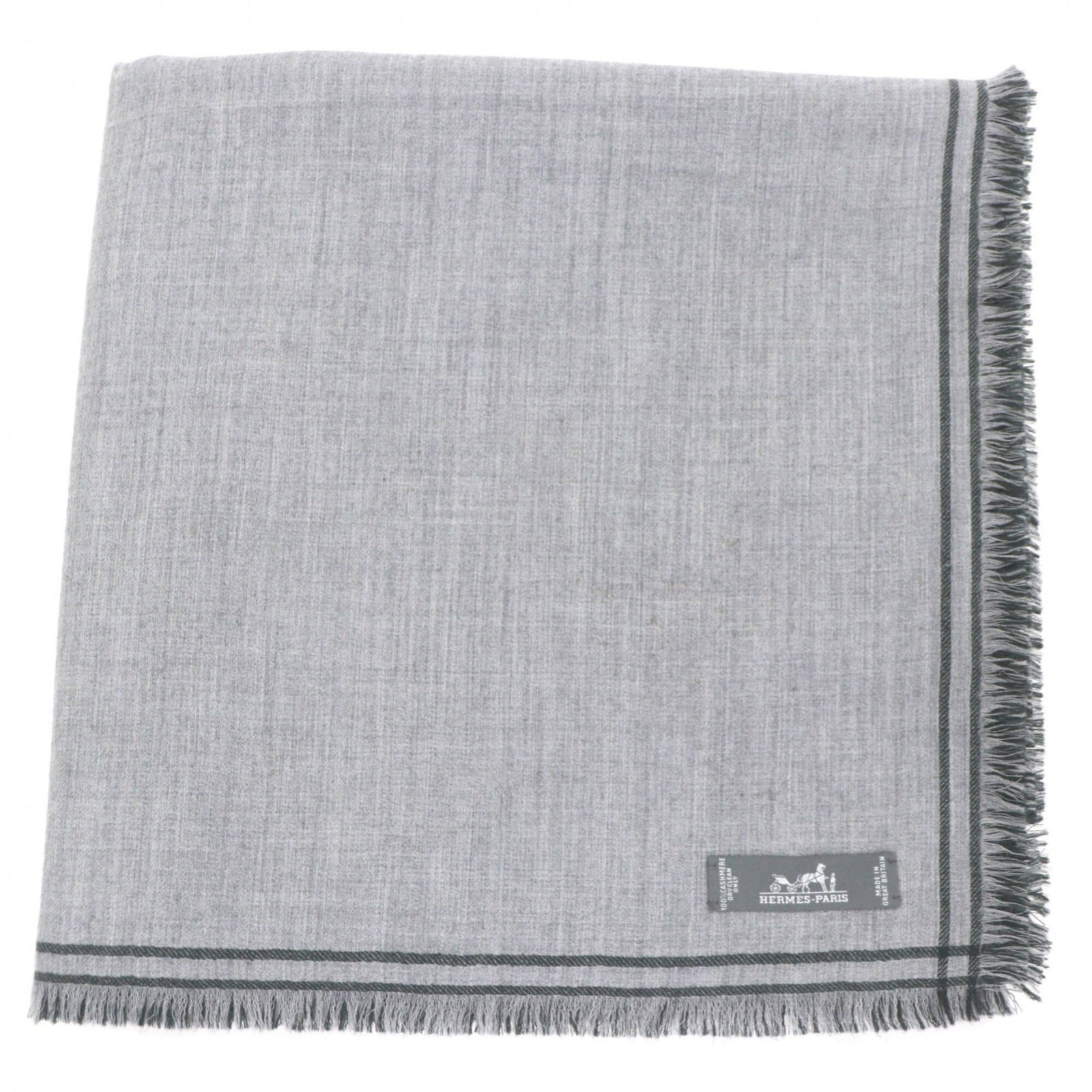 Hermes Stole Cashmere 100%: Hermes Stole Cashmere 100% The Hermes Stole Cashmere stole is a luxurious piece made from 100% cashmere, crafted in the United Kingdom. Measuring 1.4m x 1.4m, it features a neutral gray and green colo
