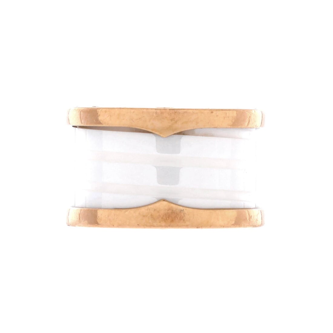 Bvlgari B.Zero1 Three Band Ring 18K Rose Gold and Ceramic: Bvlgari B.Zero1 Three Band Ring 18K Rose Gold and Ceramic The Bvlgari B.Zero1 Three Band Ring boasts an elegant combination of 18K rose gold and ceramic, creating a striking visual effect. This