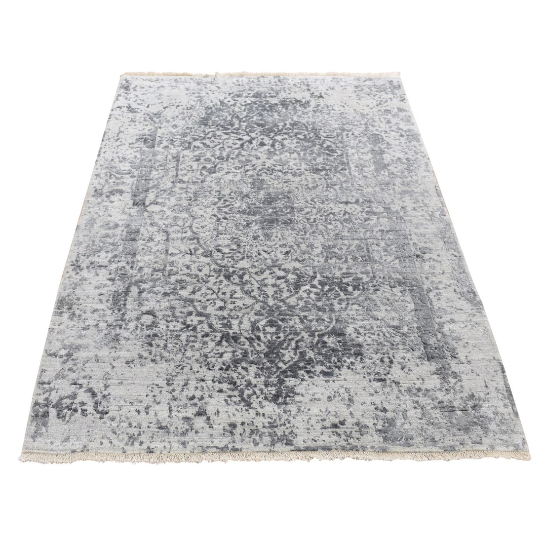 4'1"x6' Gray Erased Zoroastrian Design Wool and Silk Hand Knotted Rug: 4'1"x6' Gray Erased Zoroastrian Design Wool and Silk Hand Knotted Rug The Zoroastrian design wool and silk hand-knotted rug boasts an elegant grey color, intricately woven with a rectangular field