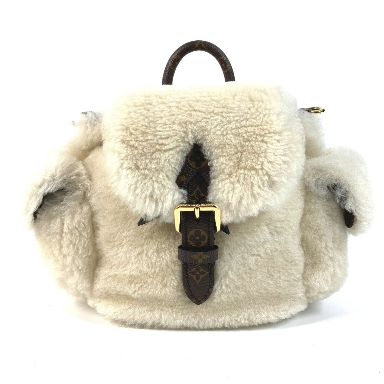 Canvas Backpack Handbag Shoulder Louis Vuitton: Canvas Backpack Handbag Shoulder Louis Vuitton Canvas Backpack Handbag Shoulder Louis Vuitton features a classic design with a beige canvas material, measuring 16.5cm x 25cm x 13cm. The bag bears a