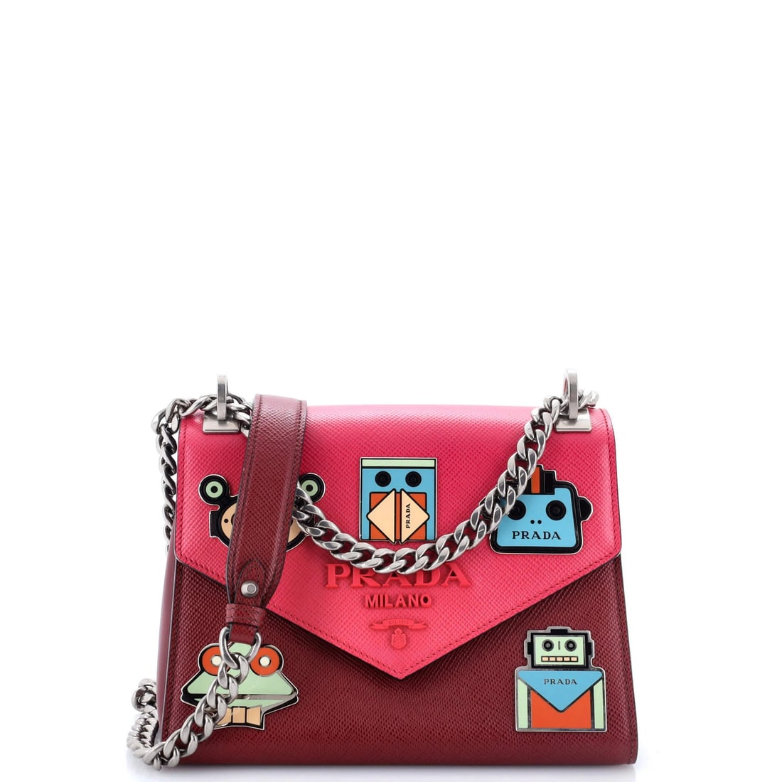 Prada Robot Patches Envelope Flap Chain Shoulder Bag Saffiano Leather Small: Prada Robot Patches Envelope Flap Chain Shoulder Bag Saffiano Leather Small The Prada Robot Patches Envelope Flap Chain Shoulder Bag boasts a striking pink and red exterior, crafted from high-quality 