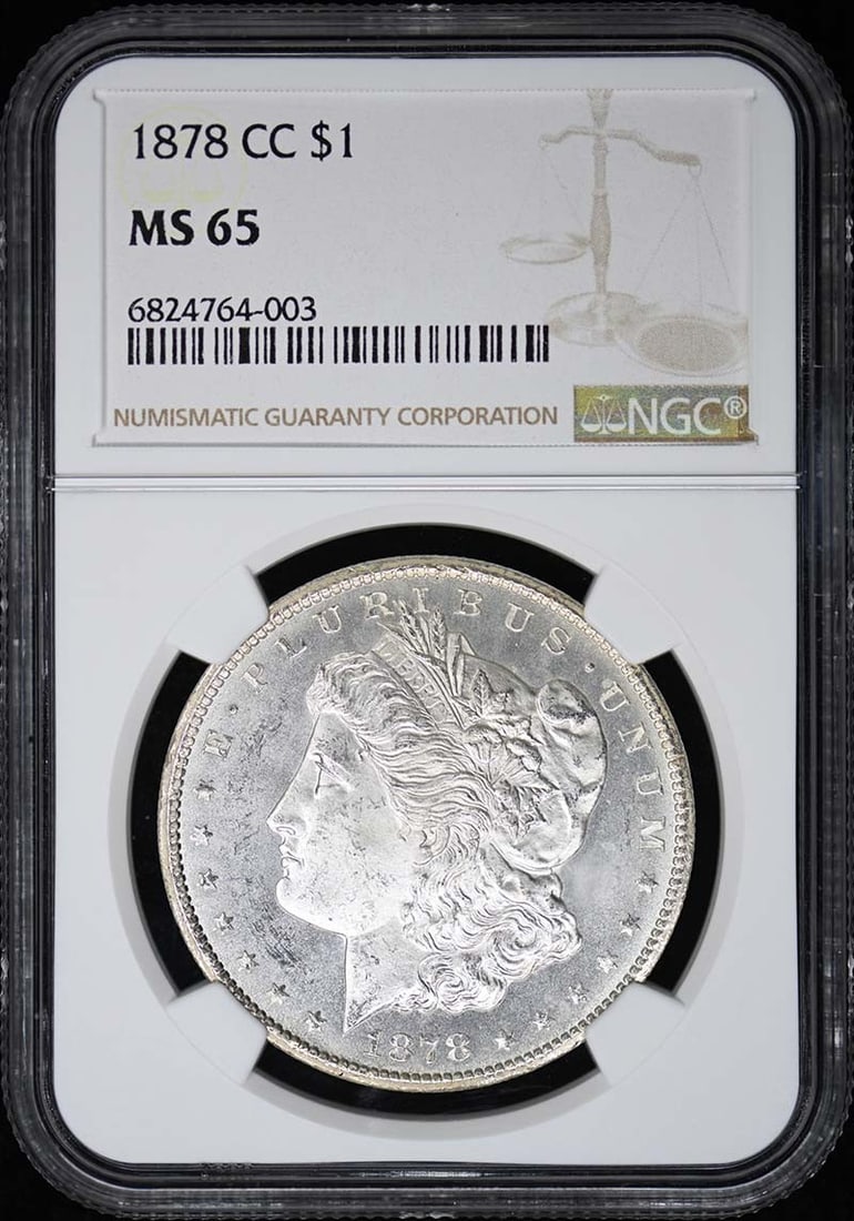 Morgan Dollar CC 1878 S$1 MS65 NGC: Morgan Dollar CC 1878 S$1 MS65 NGC The Morgan Dollar CC 1878 S$1 MS65 NGC boasts exceptional condition, graded MS65 by the Numismatic Guaranty Corporation (NGC). This uncirculated coin features a stri